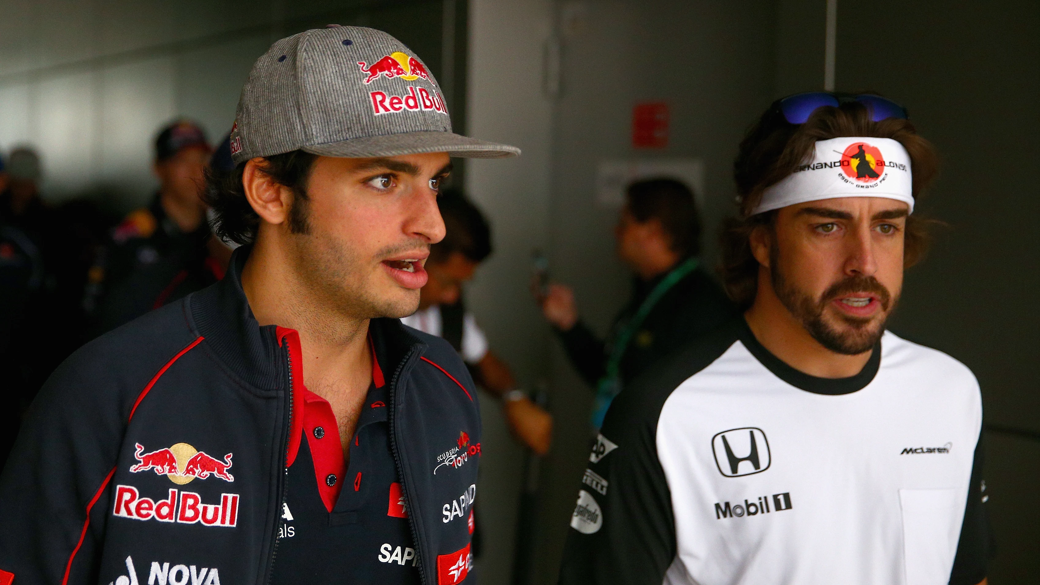 SOCHI, RUSSIA - OCTOBER 11: Carlos Sainz of Spain and Scuderia Toro Rosso speaks with Fernando